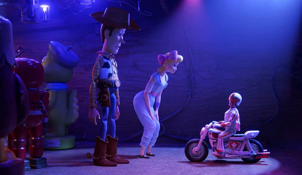 Tom Hanks as Woody, Annie Potts as Bo Beep and Keanu Reeves as Duke Caboom in Toy Story 4 Disney/Pixar.