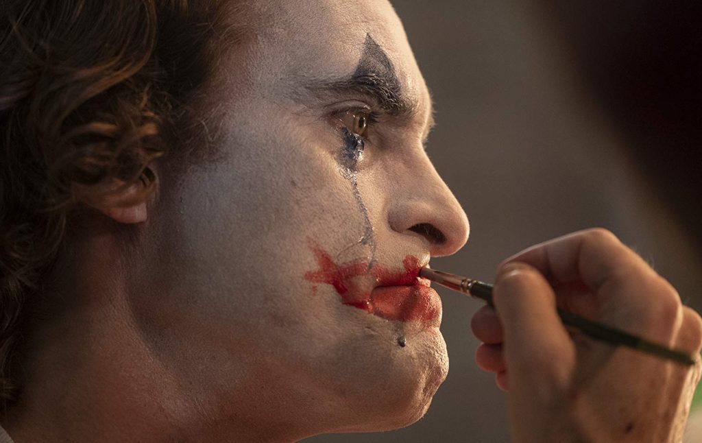 joker film movie joaquin phoenix applying makeup