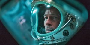 Brad Pitt wears an astronaut helmet in the film Ad Astra