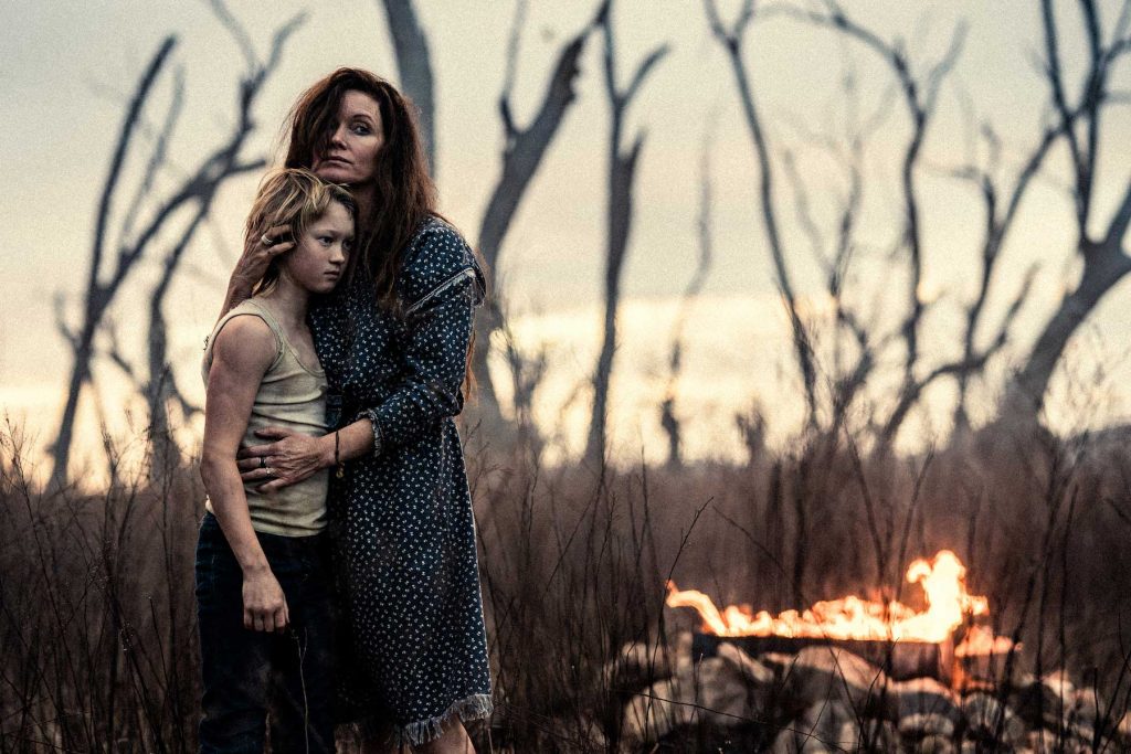 Essie Davis As “Ellen Kelly” and Orlando Schwerdt as “Young Ned Kelly” in Justin Kurzel’s The True History of the Kelly Gang