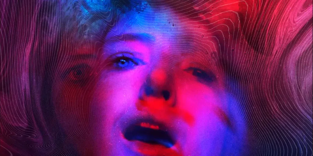 A woman's face with her mouth over with multicolored blue, pink and red shades over her in the poster of the film She Dies Tomorrow