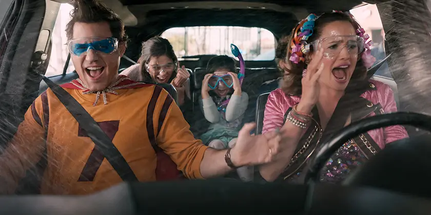 (L-r): Edgar Ramirez as Carlos Torres, Jenna Ortega as Katie Torres, Everly Carganilla as Ellie Torres, Julian Lerner as Nando Torres, Jennifer Garner as Allison Torres in Yes Day, one of all the Jenna Ortega movies and shows ranked from worst to best