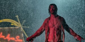 Chris Hemsworth in the rain in a scene from Bad Times at the El Royale