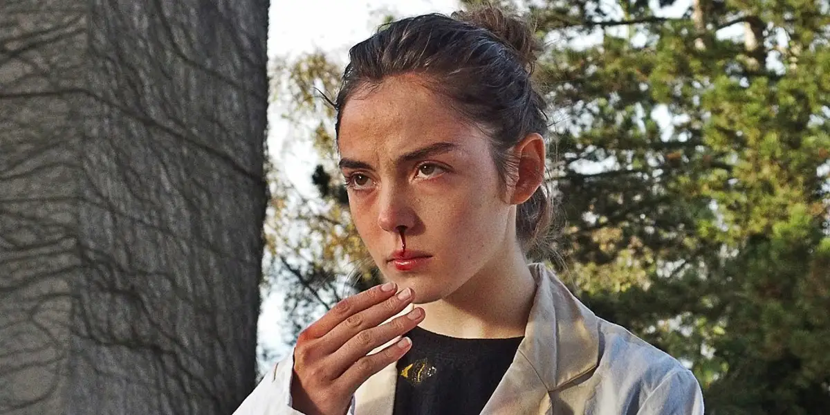 Justine (Garance Marillier), one of the 10 final girls in horror movies who absolutely deserved to die first ranked by Loud and Clear Reviews