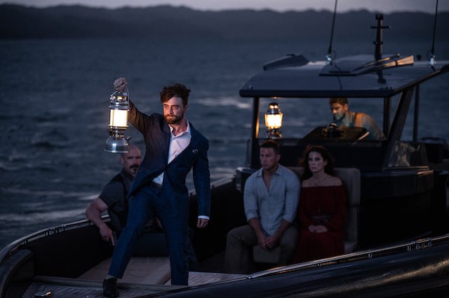 Daniel Radcliffe, Channing Tatum and Sandra Bullock on a boat in The Lost City