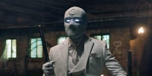 Oscar Isaac wears a white suit and mask as Steven Grant/Marc Spector in Marvel Studios' MOON KNIGHT