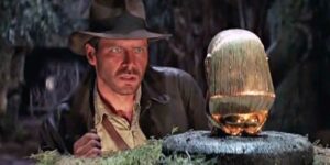 Harrison Ford looks at the gauntlet in the opening scene of Raiders of the Lost Ark