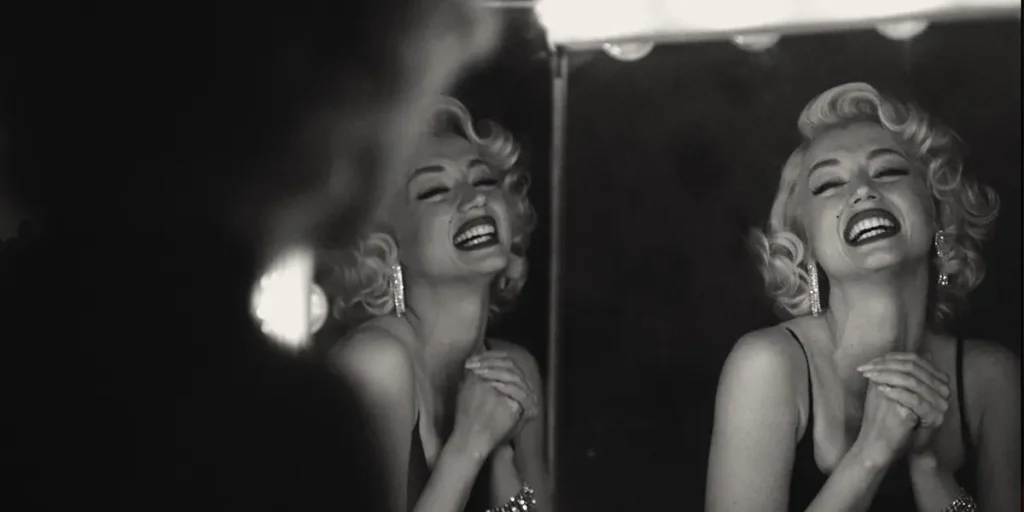 Ana de Armas as Marilyn Monroe in a black and white still from the movie Blonde