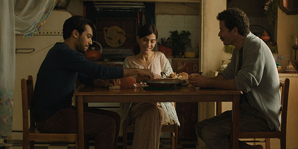 The Blue Caftan dinner table scene