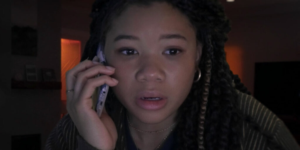 a girl is on the phone and looks worried in the film Missing