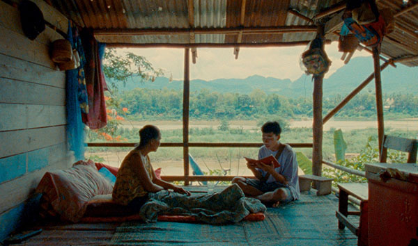 two boys sit on the floor in Lois Patiño's Samsara