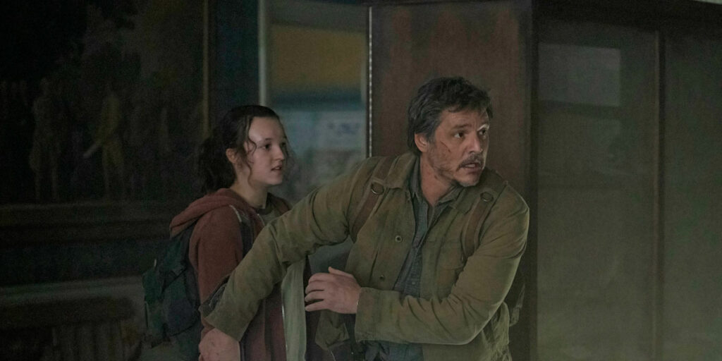 Bella Ramsey and Pedro Pascal hide in The Last of Us