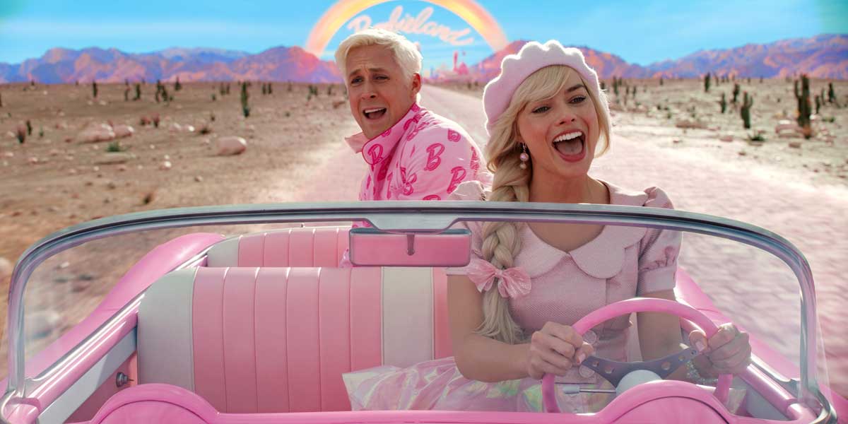 Ken and Barbie sing in a pink car in Barbie, one of the movies directed by Greta Gerwig ranked from worst to best by Loud and Clear Reviews