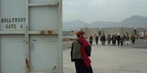 A man stands at the border in a still from the film Hollywoodgate