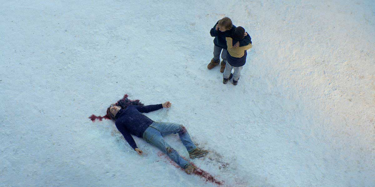 Two characters in the snow in the film Anatomy of a Fall, one of the films featured on Loud and Clear Reviews' Oscar Race Stock Up / Stock Down article on the nominees