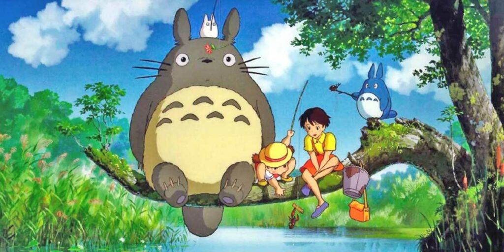 Totoro and his friends sit on a branch in the film My Neighbor Totoro