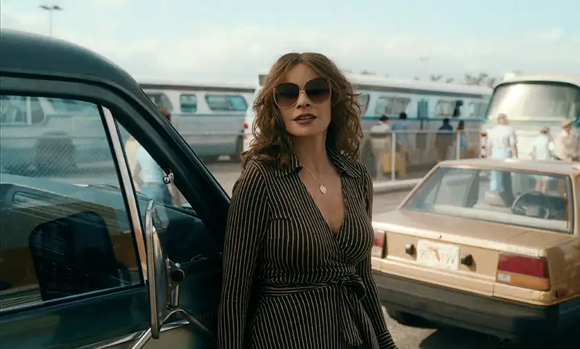 Sofia Vergara stands by a car in episode 102 of Netflix show Griselda