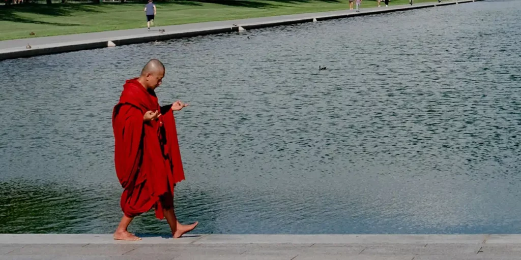 A monk walks in the film Abiding Nowhere