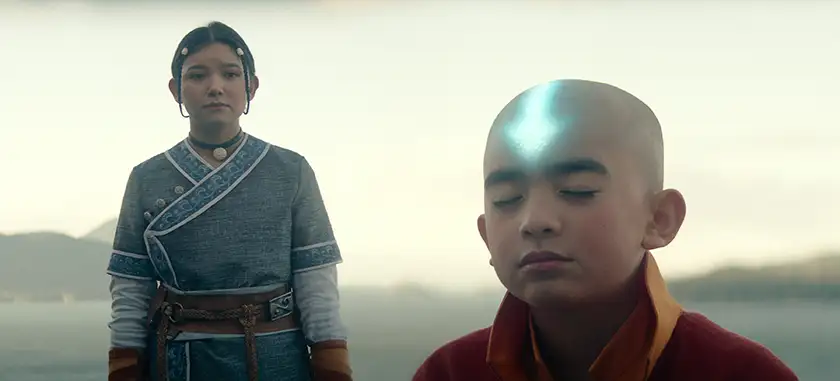 Gordon Cormier as Aang is one of the things we love about Avatar the Last Airbender (2024). Here, he meditates with Kiawentiio as Katara standing behind him