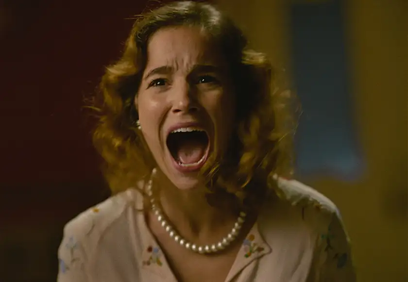 Alba Baptista screams in terror in the film AMELIA’S CHILDREN