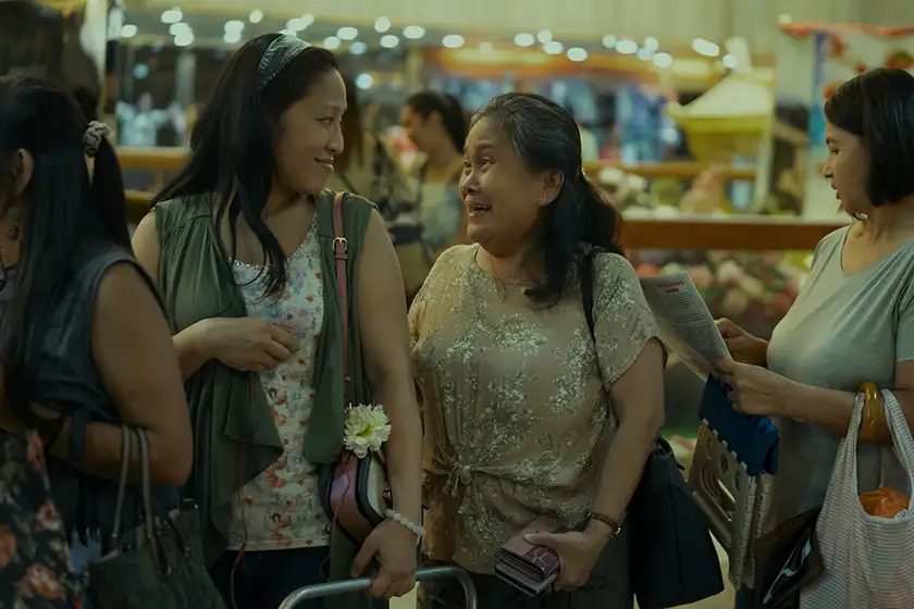 Puri (Amelyn Pardenilla) and Essie (Ruby Ruiz) chat in Episode 5 of Expats