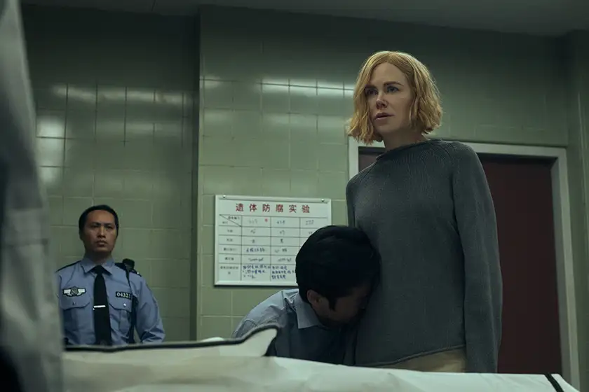 A child hugs Nicole Kidman in Episode 4 of Prime Video series Expats