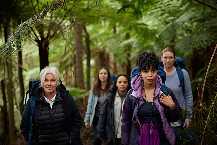 Women in the forest in the film Force of Nature: The Dry 2, reviewed on Loud and Clear Reviews