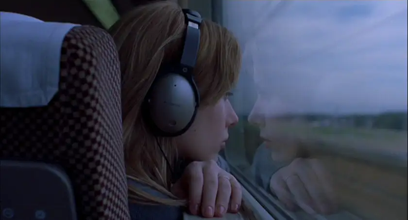 Scarlett Johansson looks out of the train window in the film Lost in Translation