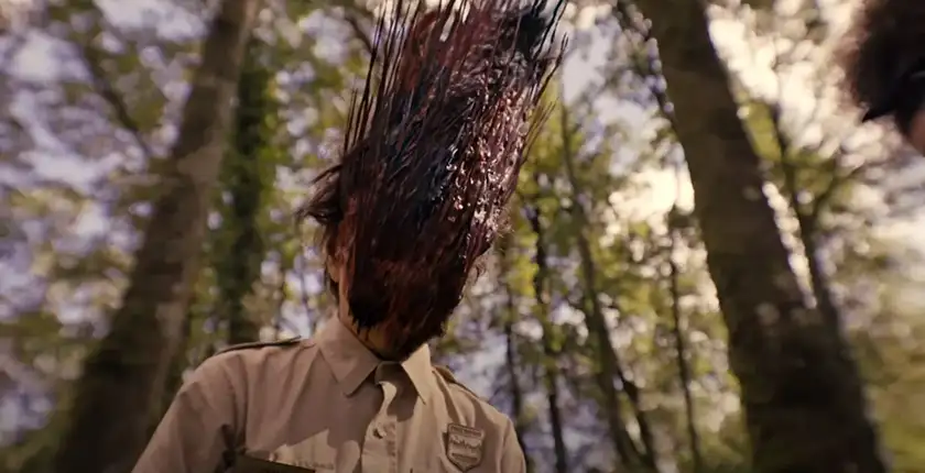 A park ranger has spikes coming out of their head in the film Lovely, Dark, and Deep