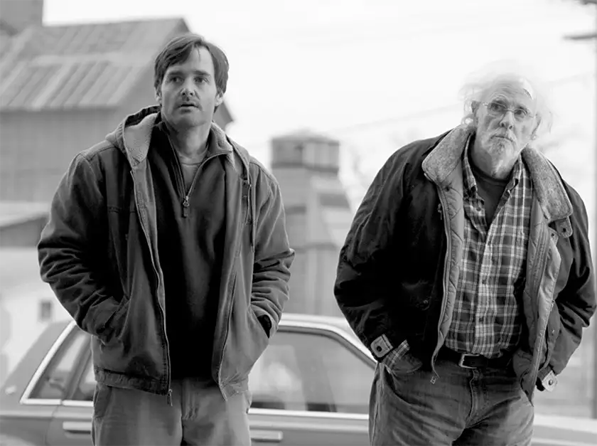 two men stand next to each other in the film Nebraska