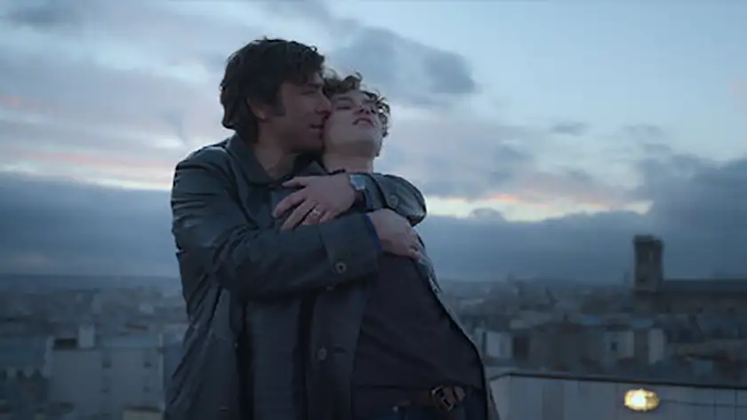 Young Tommaso and young Rocco hug in the Netflix series Supersex