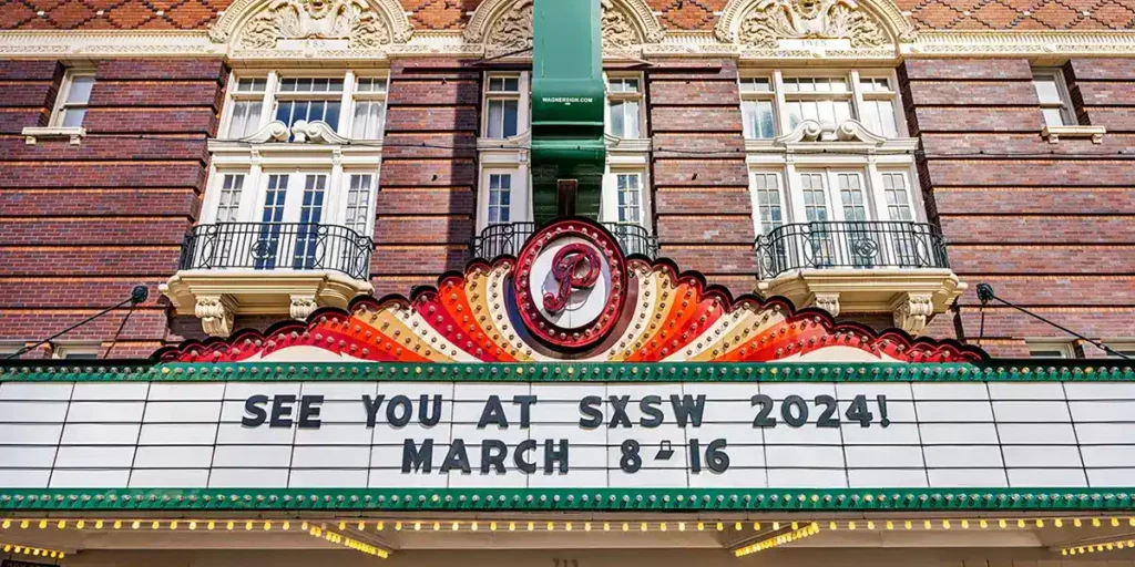 A sign reads "see you at sxsw 2024"