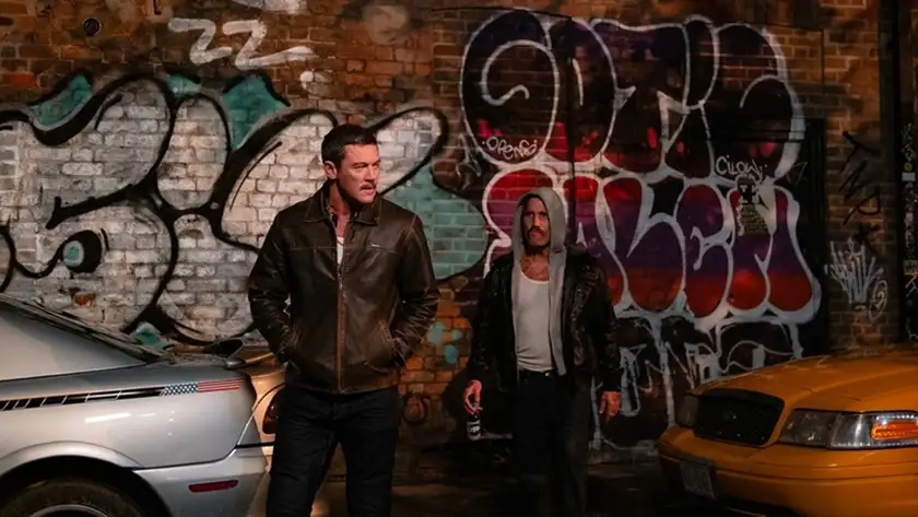 Luke Evans stands in front of a graffiti in the film 5LBS of Pressure
