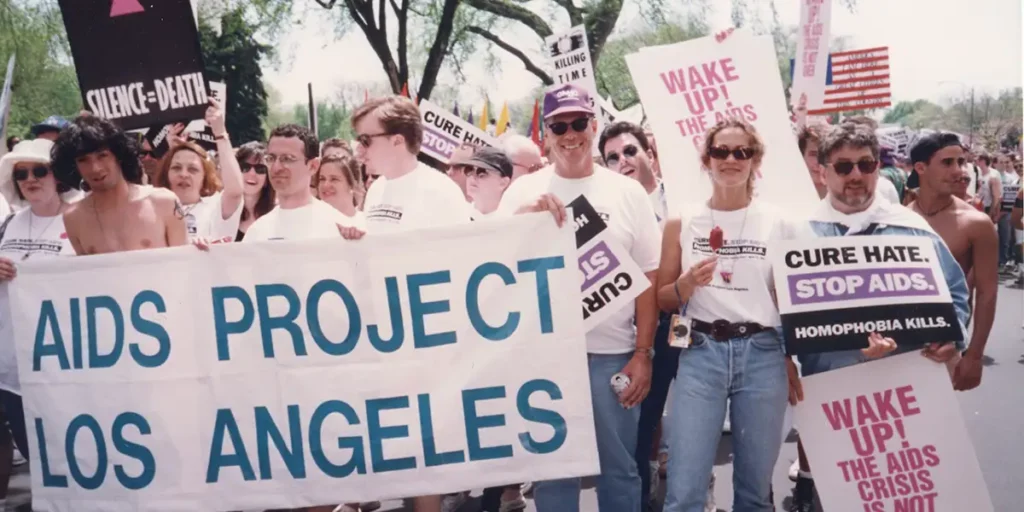 People protest in a march for AIDS in the documentary Commitment to Life