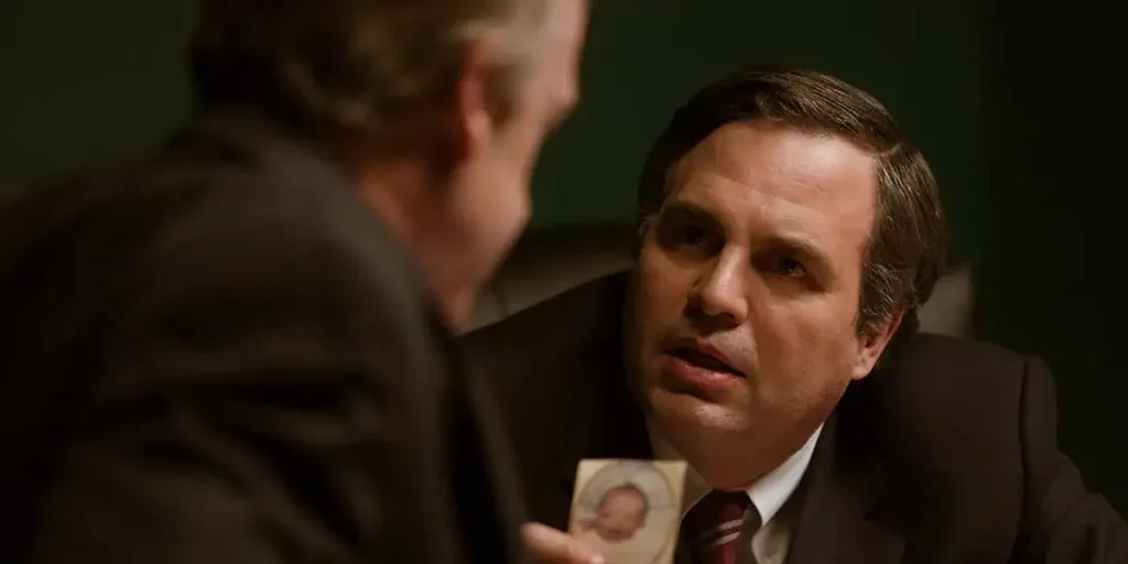 Mark Ruffalo holds a piece of paper in the film Dark Waters