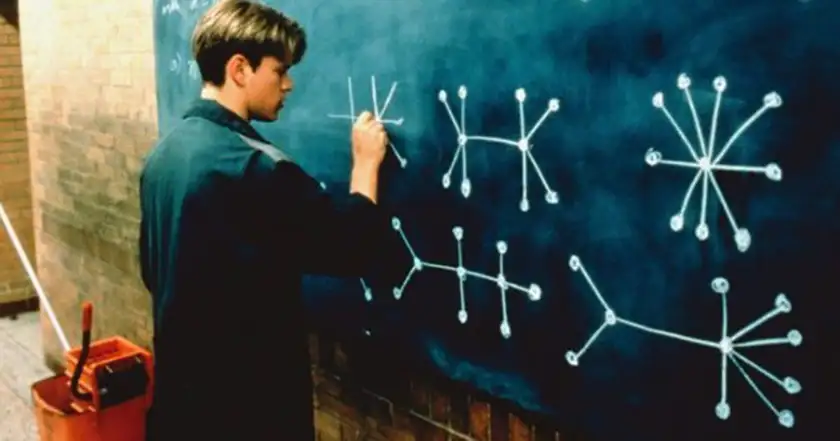Matt Damon writes on a blackboard in the film Good Will Hunting, one of the 5 Films About Math to watch on Pi Day according to Loud And Clear Reviews
