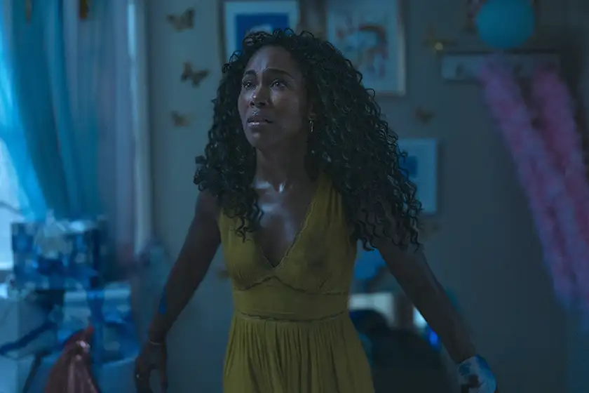 DeWanda Wise as Jessica is in a room looking at something in distress in the film Imaginary