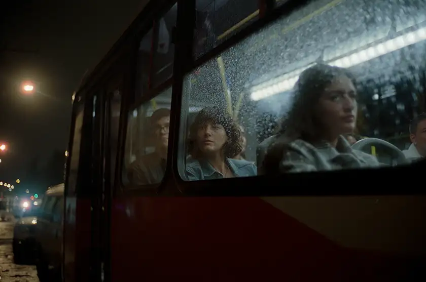 A shot of a bus seen from the road, with women sitting inside it, in the SXSW 2024 film Malta