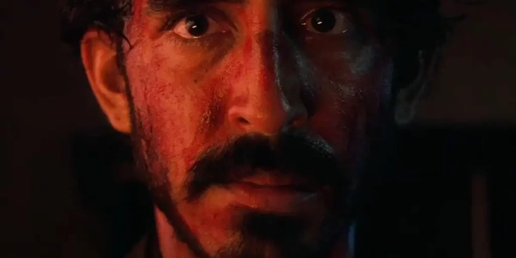 A close up of Dev Patel's face in the film Monkey Man