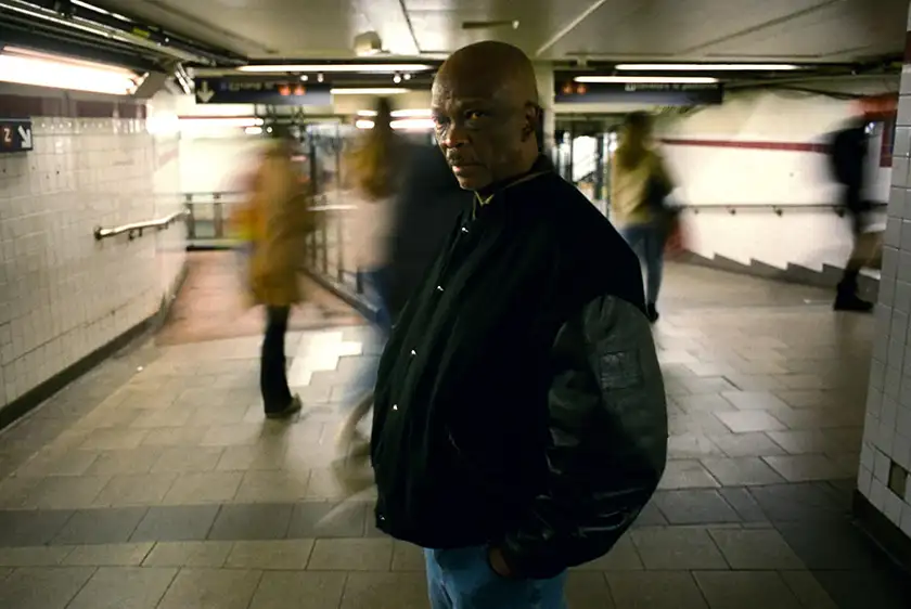 Wilfred Rose stands in a corridor of the New York Subway in the documentary short film Shotplayer