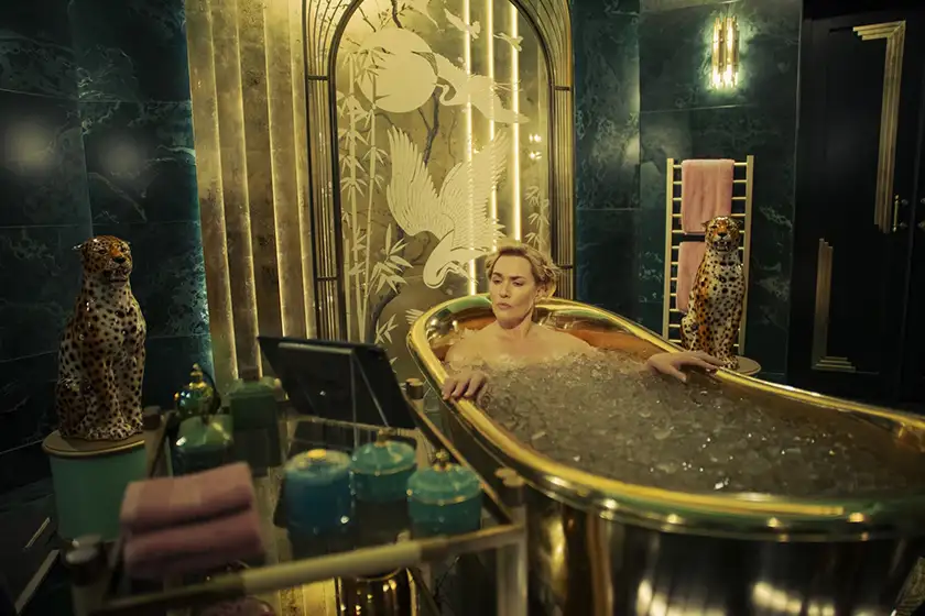 Kate Winslet is in a golden bathtub in season 1 episode 4 of THE REGIME