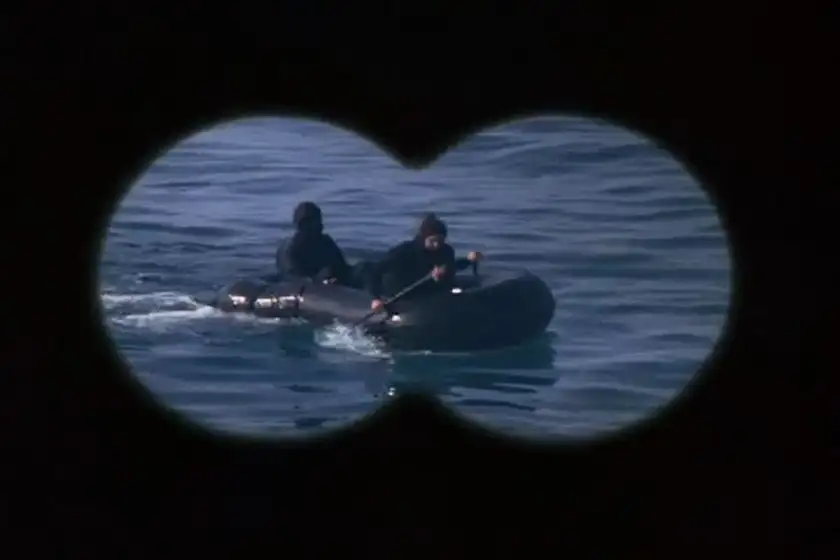 A rubber boat as seen through binoculars in Episode 9 of Wonder Woman (1975)