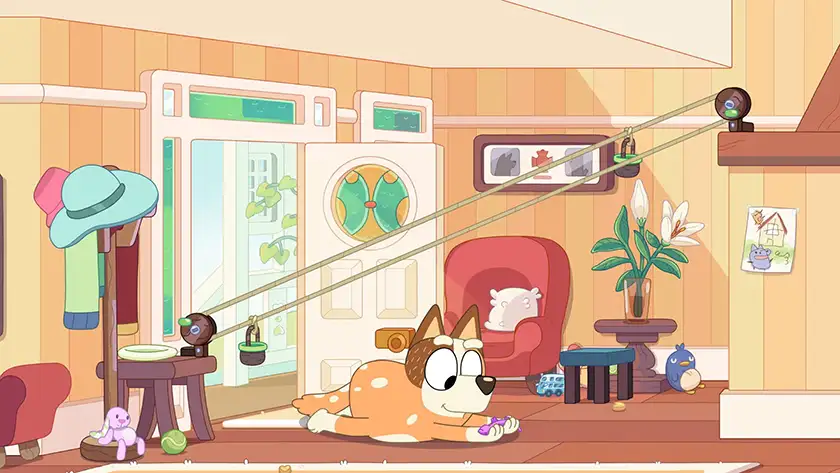Chilli catches a Gecko in the Bluey episode Sticky Gecko