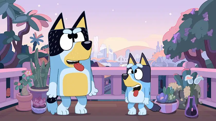 Bluey and a copycat stand next to each other on a balcony, surrounded by plants, in "Copycat", one of the 5 Best episodes of the character Bluey ranked from worst to best according to Loud and Clear Reviews