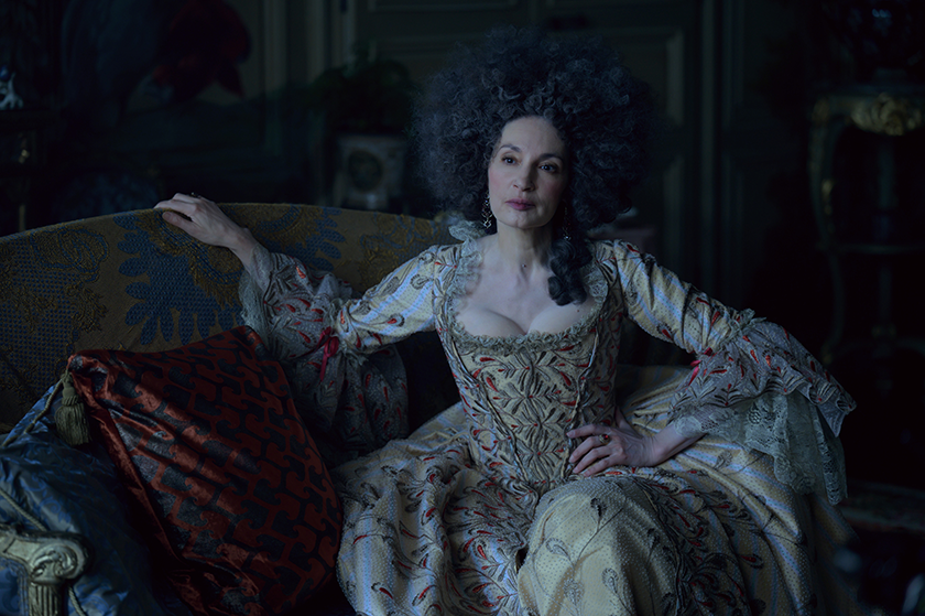 Marie Antoinette sits on a couch in episode 4 of Franklin