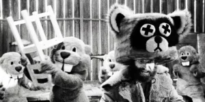 A black and white photo of people causing mayhem in beaver costumes in the 2024 movie Hundreds of Beavers