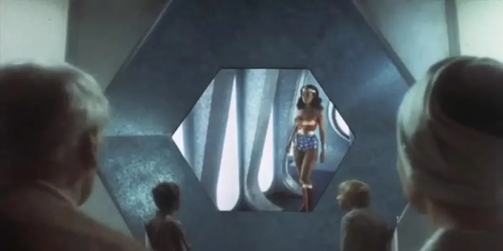People look at wonder woman through a glass in episode 11 of Wonder Woman (1975)