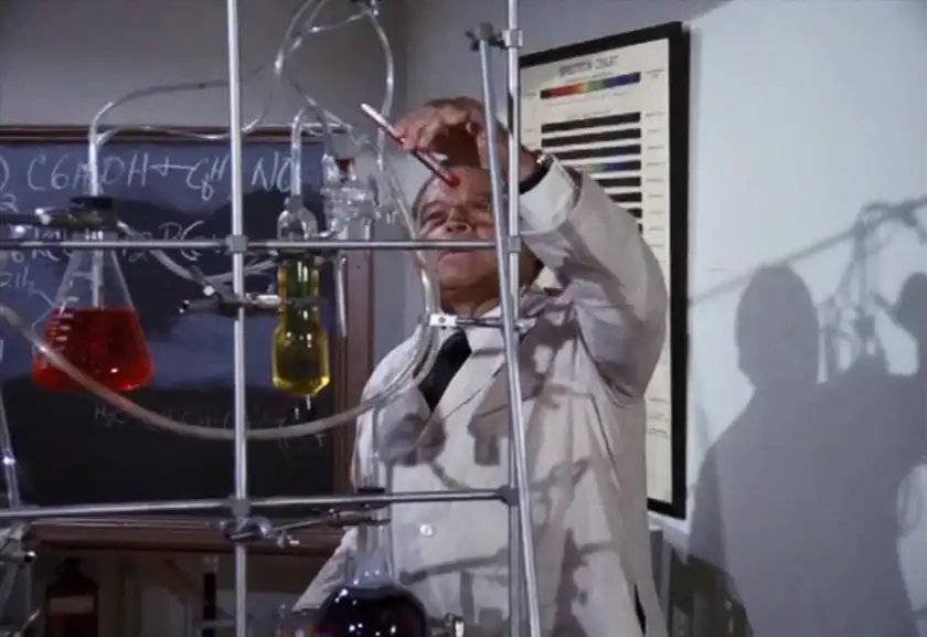 A scientist tinkers with some pots in Episode 12 of Wonder Woman (1975)