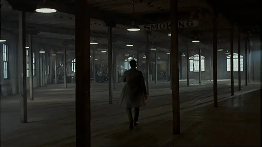 A man walks in a house surrounded by columns in the film The Conversation, one of all Francis Ford Coppola movies ranked from worst to best by Loud and Clear Reviews