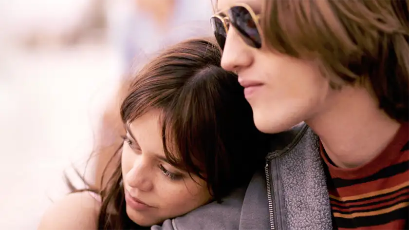 A couple leans on each other in the movie Winter Spring Summer or Fall